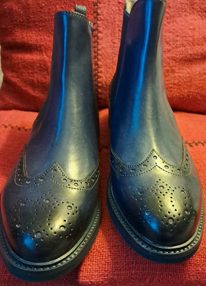 Neues Paar blaue Stiefeletten