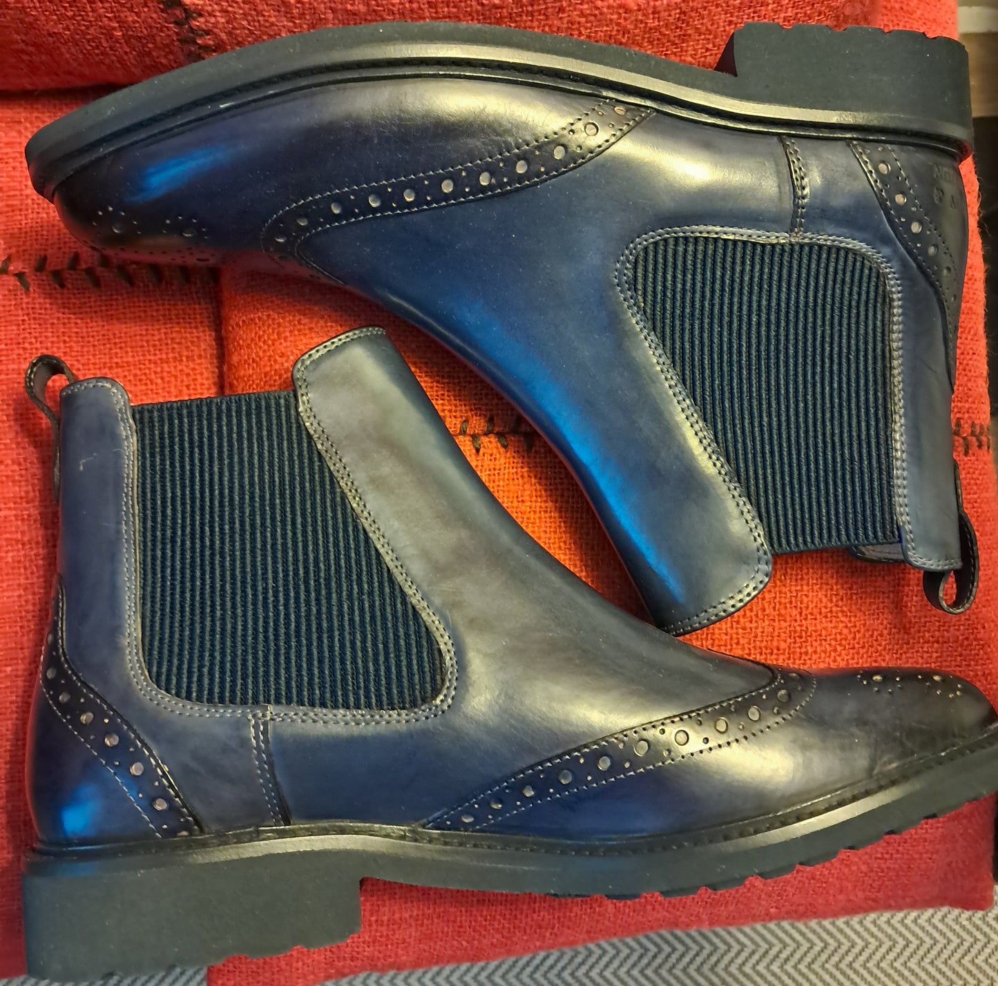 Neues Paar blaue Stiefeletten